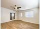 Living space featuring wood-look floors and bright windows at 1219 E Colter St # 8, Phoenix, AZ 85014