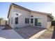 Back patio with tiled area providing a relaxing outdoor space at 12205 N 41St Ln, Phoenix, AZ 85029
