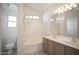 Bathroom with vanity, tub/shower combo and toilet at 12205 N 41St Ln, Phoenix, AZ 85029