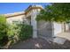 Inviting front entrance with well-maintained landscaping and a charming walkway at 12205 N 41St Ln, Phoenix, AZ 85029
