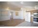 Spacious open-concept home featuring a bright living space with modern kitchen at 12205 N 41St Ln, Phoenix, AZ 85029