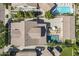 Stunning aerial view of a home featuring a backyard with a pool and an outdoor seating area at 1379 S Claiborne Ave, Gilbert, AZ 85296