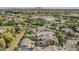 Aerial view of a community with mature trees and landscaping, well-maintained properties, and backyard pools at 1379 S Claiborne Ave, Gilbert, AZ 85296