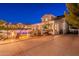 Relaxing backyard featuring a pool, fire pit, grill and a bar, perfect for outdoor entertaining and lounging at 1379 S Claiborne Ave, Gilbert, AZ 85296