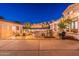 Spacious backyard with fire pit, barbecue grill, outdoor bar, and ample seating for comfortable outdoor living at 1379 S Claiborne Ave, Gilbert, AZ 85296