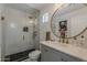 Modern bathroom with a glass-enclosed shower, stylish vanity, and elegant fixtures at 1379 S Claiborne Ave, Gilbert, AZ 85296