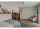 Cozy bedroom featuring two beds and ample storage at 1379 S Claiborne Ave, Gilbert, AZ 85296