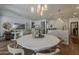 Open-concept dining area seamlessly connects to the living room and kitchen, perfect for entertaining at 1379 S Claiborne Ave, Gilbert, AZ 85296