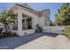Charming home featuring a covered patio, a large backyard, and a spacious driveway at 1379 S Claiborne Ave, Gilbert, AZ 85296