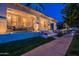 Charming home with a spacious front porch and brick detailing, perfect for enjoying outdoor living at 1379 S Claiborne Ave, Gilbert, AZ 85296