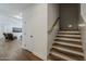 Inviting interior hallway with wood floors and staircase leading to the living area at 1379 S Claiborne Ave, Gilbert, AZ 85296