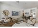 Bright living room featuring stylish furnishings and modern decor perfect for entertaining guests at 1379 S Claiborne Ave, Gilbert, AZ 85296