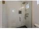 Sleek walk-in shower with white subway tile, matte black fixtures, and a glass door at 1379 S Claiborne Ave, Gilbert, AZ 85296