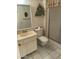 Functional bathroom featuring a vanity, toilet, and shower at 15438 N Lakeforest Dr, Sun City, AZ 85351