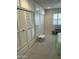 Bedroom with large built-in closet and shuttered window at 15438 N Lakeforest Dr, Sun City, AZ 85351