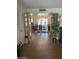 Inviting dining area with wood floors and a colorful rug is perfect for gatherings at 15438 N Lakeforest Dr, Sun City, AZ 85351