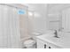 Bright bathroom featuring a shower, a toilet, and a vanity with mirror and sink at 2545 E Harrison Ct, Gilbert, AZ 85295