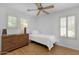 Bright bedroom with hardwood floors and a window with blinds at 2545 E Harrison Ct, Gilbert, AZ 85295
