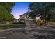 Charming two-story home with a well-manicured lawn and mature landscaping, great curb appeal at 2545 E Harrison Ct, Gilbert, AZ 85295