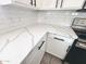 Bright kitchen features white cabinets, modern hardware, quartz countertops, and subway tile backsplash at 2545 E Harrison Ct, Gilbert, AZ 85295