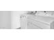 Convenient laundry area features a modern washing machine and dryer for easy chore completion at 2545 E Harrison Ct, Gilbert, AZ 85295