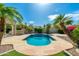 Inviting pool with ample patio space and lush landscaping for outdoor relaxation at 6428 E Nisbet Rd, Scottsdale, AZ 85254