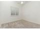 Bedroom featuring neutral decor, and window with shutter blinds allowing in ample natural light at 6428 E Nisbet Rd, Scottsdale, AZ 85254