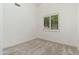 Bedroom featuring neutral decor, and window with shutter blinds allowing in ample natural light at 6428 E Nisbet Rd, Scottsdale, AZ 85254