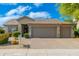 Charming single-story home with a well-maintained yard and a spacious three-car garage at 6428 E Nisbet Rd, Scottsdale, AZ 85254