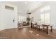 Bright living space with vaulted ceilings, hardwood floors, and an open concept layout at 6428 E Nisbet Rd, Scottsdale, AZ 85254
