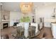 Dining room with a view of the open kitchen and living space at 6428 E Nisbet Rd, Scottsdale, AZ 85254
