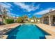 Private backyard pool featuring lush landscaping and a serene setting for relaxation and recreation at 6428 E Nisbet Rd, Scottsdale, AZ 85254