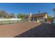 Large backyard features a pool behind a gated fence and a covered patio area for entertaining at 702 W Sequoia Dr, Phoenix, AZ 85027