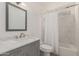 Bathroom with modern vanity and combination shower and tub at 702 W Sequoia Dr, Phoenix, AZ 85027