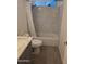 Full bath features a shower-tub combo and updated vanity at 702 W Sequoia Dr, Phoenix, AZ 85027