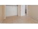 Bedroom offering a closet and private entry into the ensuite bath at 702 W Sequoia Dr, Phoenix, AZ 85027