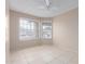 Bedroom featuring tile floor and corner windows at 702 W Sequoia Dr, Phoenix, AZ 85027