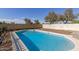 Backyard pool showcasing a refreshing and well-maintained outdoor space at 702 W Sequoia Dr, Phoenix, AZ 85027