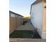 The side yard features gravel and minimal landscaping, offering a practical and low-maintenance outdoor space at 7616 W Jones Ave, Phoenix, AZ 85043