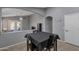 Open-concept kitchen and dining area with modern finishes and neutral color palette at 8524 S 49Th Ln, Laveen, AZ 85339