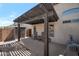 Covered patio area with neutral color scheme, featuring patio furniture perfect for outdoor relaxation at 8524 S 49Th Ln, Laveen, AZ 85339