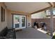 Covered patio with French doors, a bench, and a grill at 8524 S 49Th Ln, Laveen, AZ 85339