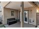 Covered patio with outdoor seating and exterior view at 8524 S 49Th Ln, Laveen, AZ 85339