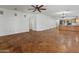 Expansive living room with open layout, flowing into kitchen area at 9852 W Salter Dr, Peoria, AZ 85382
