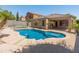 Inviting backyard pool with mature palm trees and ample patio space for entertaining or relaxing at 9852 W Salter Dr, Peoria, AZ 85382