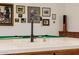 Bright kitchen sink with modern faucet and soap dispenser, set against a backdrop of a pool table at 10934 E La Verna Way, Scottsdale, AZ 85262