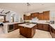 Stylish kitchen with a large island, ample counter space, and stainless steel appliances at 10934 E La Verna Way, Scottsdale, AZ 85262