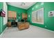 Home office featuring custom cabinets, large window, and functional island desk at 10934 E La Verna Way, Scottsdale, AZ 85262