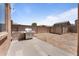 Backyard featuring a built-in grill and ample space for outdoor activities at 10939 W Meadowbrook Ave, Phoenix, AZ 85037