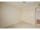 Bedroom with neutral carpet features a closet with white doors at 1139 E Stephens Dr, Tempe, AZ 85283